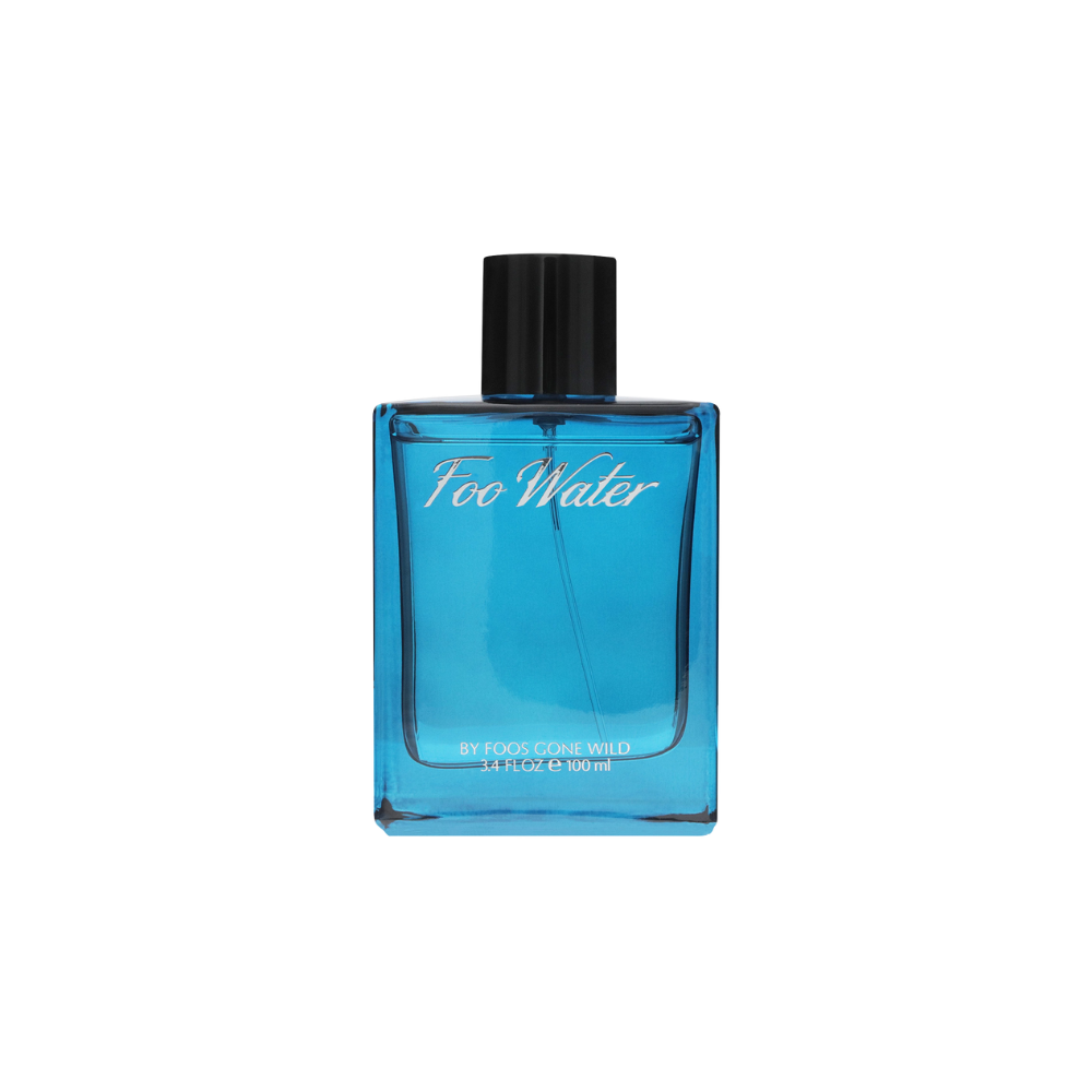 Blue perfume bottle with black cap on a white background